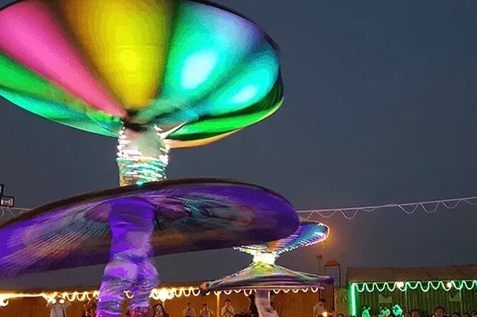 Dubai desert safari with 4x4 Dune Bashing,Camel Ride sand board - Dinner, Refreshments, and Evening Shows