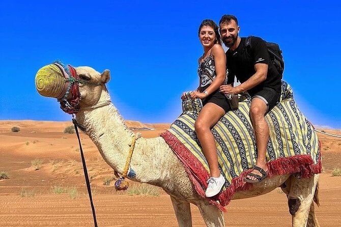 Dubai Desert Safari with Adventure Quad Bike and Buggy Ride - The camel ride adds a traditional touch