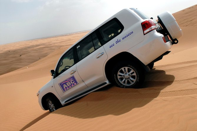 Dubai Desert Safari with BBQ, 3 Shows & Camel Ride at Majlis Camp - Key things to know before booking