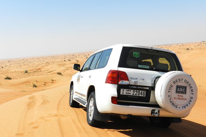 Dubai Desert Safari with BBQ, 3 Shows & Camel Ride at Majlis Camp - Dune bashing over the golden dunes