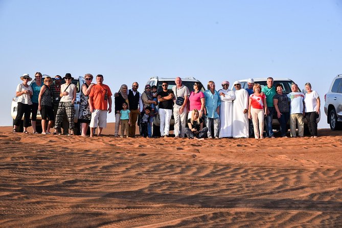 Dubai Desert Safari with BBQ and 4WD Land Cruiser Dune Bashing - Sunset photographs across the dunes