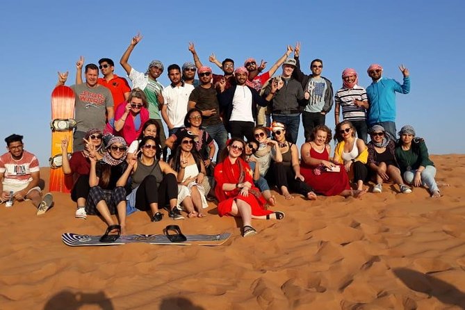 Dubai Desert Safari with BBQ Dinner, Camel Ride, and Shows - Tanura, belly dancing, and fire shows