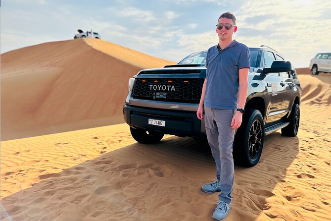 Dubai Desert Safari with BBQ Dinner & Shows from Ras Al Khaimah - Camel riding at sunset