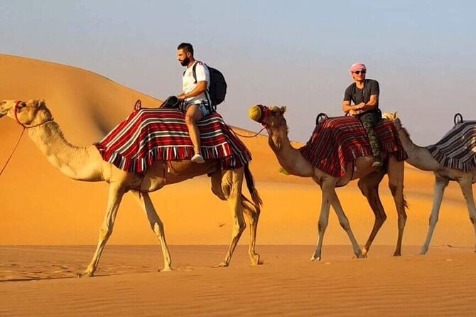 Dubai Desert Safari With Buffet Dinner Tour - The desert camp after sunset