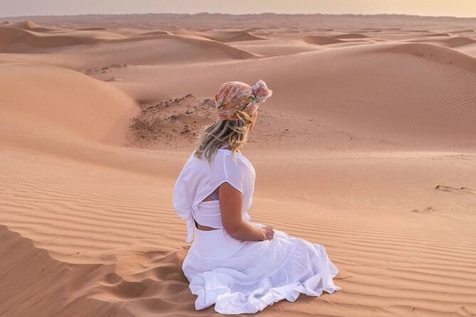 Dubai Desert Safari With Buffet Dinner Tour - Quad biking and camel riding at the meeting point