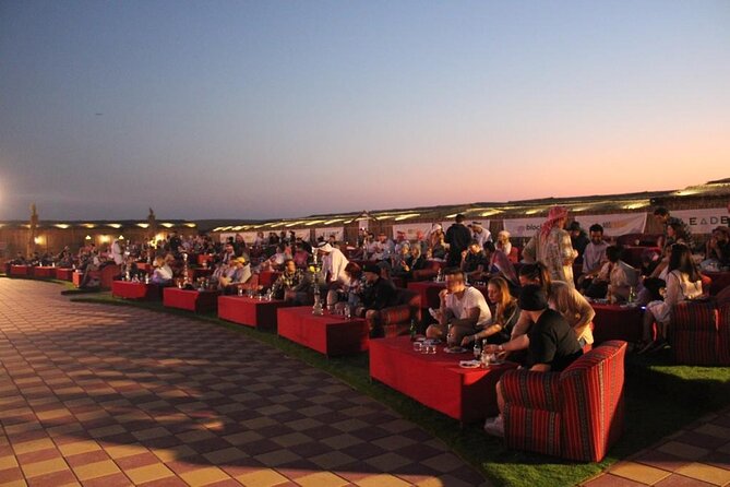 Dubai Desert Safari: with Camel Ride, live entertainment and bbq - Camel riding and sandboarding at a slower pace