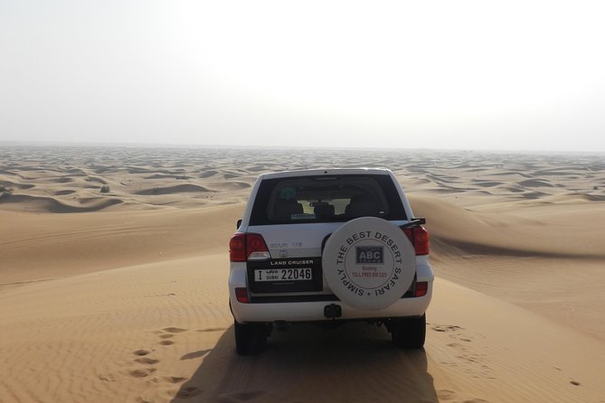 Dubai Desert Safari with Camel Ride, Show, BBQ and Transfers - Dinner under the stars