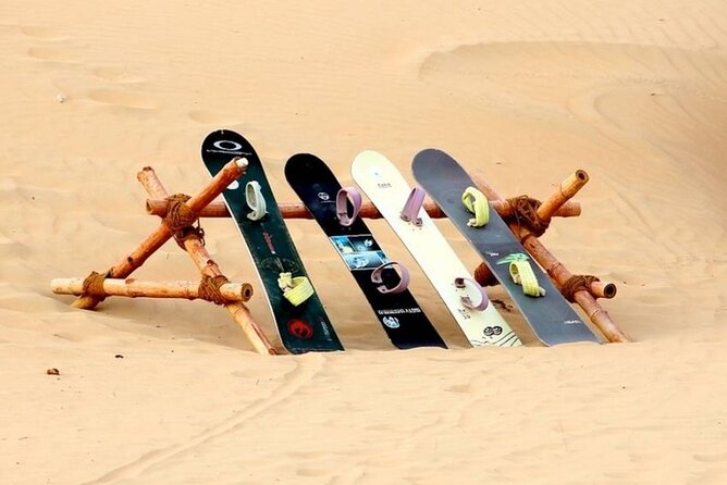 Dubai Desert Safari with Camel Riding, Sand Boarding,BBQ Dinner and 3 Live Shows - Belly dancing, tanoura, and the fire show