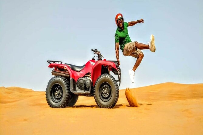 Dubai Desert Safari With Camp Activities and ATV Self Drive Quad Bike - Sunset, camel riding, and sandboarding