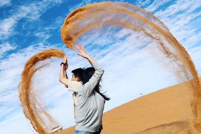 Dubai Desert Safari With Dinner And Live Shows - Red sand dune bashing in a Land Cruiser