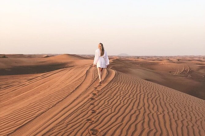 Dubai Desert Safari with Dinner, Camel Ride & Dune Bashing - Belly dancing, tanura, and fire on stage