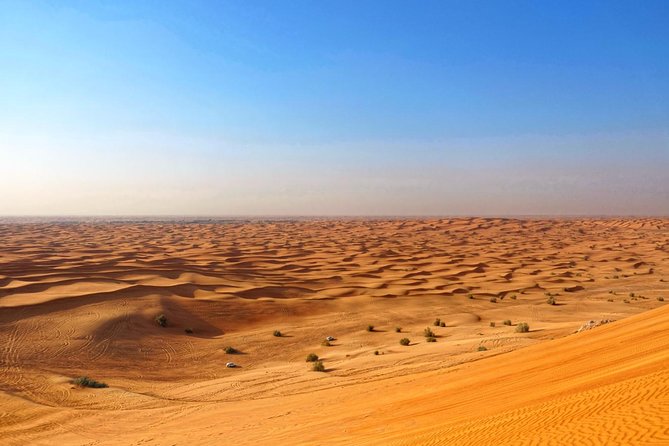 Dubai Desert Safari with Dune Bashing, Camel Rides & BBQ - Sunset from a high dune