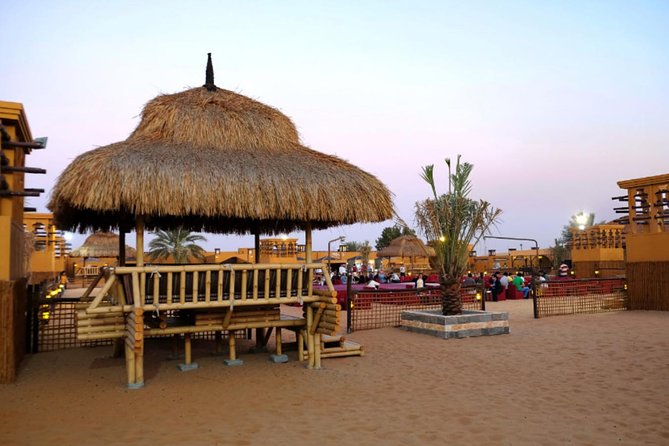 Dubai Desert Safari with Dune Bashing, Camel Rides & BBQ - Sand boarding and camel rides