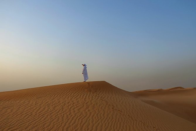 Dubai Desert Safari with Dune Bashing, Camel Rides & BBQ - Belly dancing and Tanoura after dinner