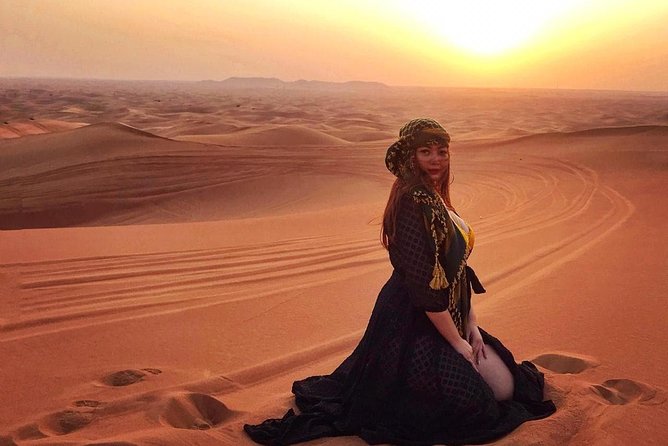 Dubai Desert Safari with Dune Bashing , Dinner Buffet & Entertainments - Sandboarding and the short camel ride