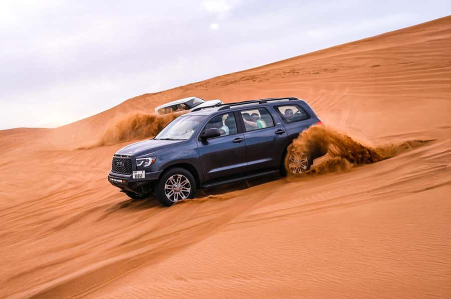 Dubai: Desert Safari with VIP BBQ and Optional Quad Bike - Red dunes, sandboarding, and the main 4x4 thrill
