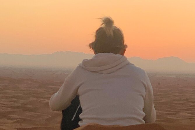 Dubai Desert Sunrise with Dune Bashing & Camel Ride - Sandboarding on the red dunes