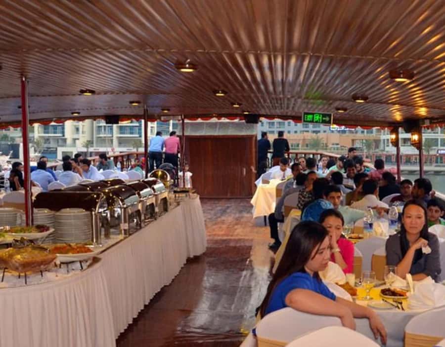 Dubai: Dhow Dinner Cruise on Creek or Marina with Live Shows - Setting out on a traditional wooden dhow