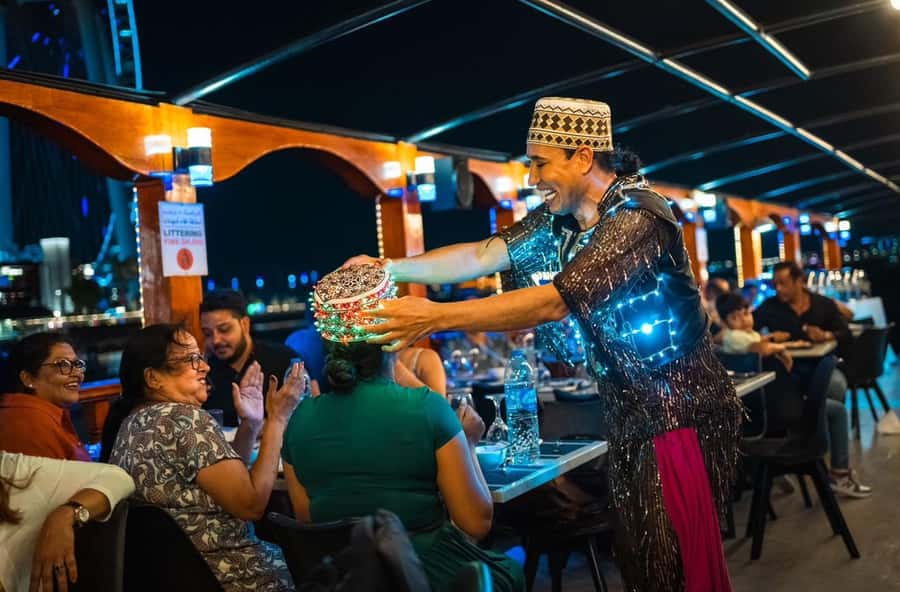Dubai: Dinner Dhow Cruise with Live Entertainment Al Seef - Seeing Dubai Creek from a wooden dhow