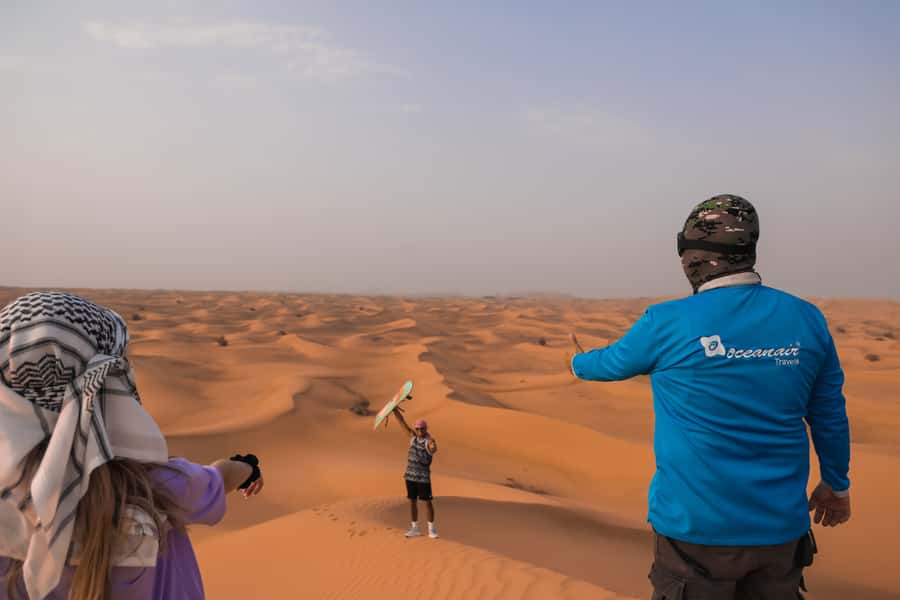 Dubai: Dune Buggy Desert Safari, Camel Ride & Sandboarding - Sandboarding on the Lehbab slopes