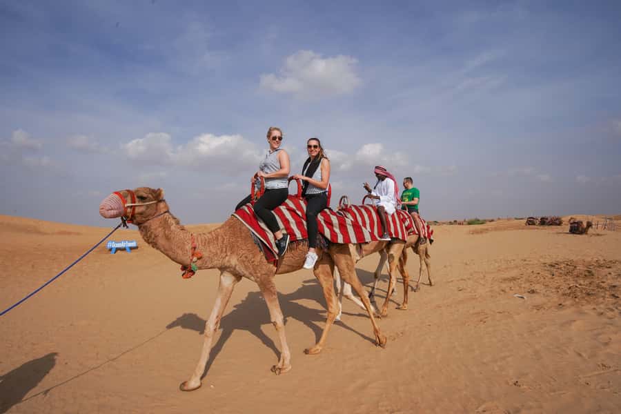 Dubai: Dune Buggy Desert Safari, Camel Ride & Sandboarding - From your hotel to the red dunes