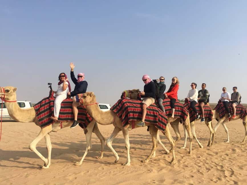 Dubai: Dune Quad Drive, Camels And Sand Boarding - Guides, photographs, and the human side