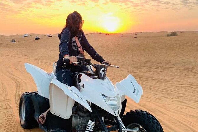 Dubai Dunes Safari With Quad Bike, Camel Ride, BBQ Dinner & Live Shows - Camel riding at sunset