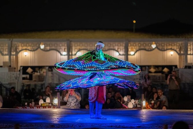 Dubai Dunes Safari With Quad Bike, Camel Ride, BBQ Dinner & Live Shows - The Al Awir camp after dark