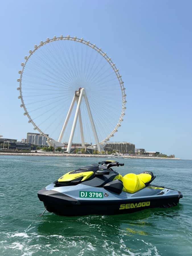 Dubai East: Guided JetsKi Ride with Sound System! - Ain Dubai and the Bluewaters skyline