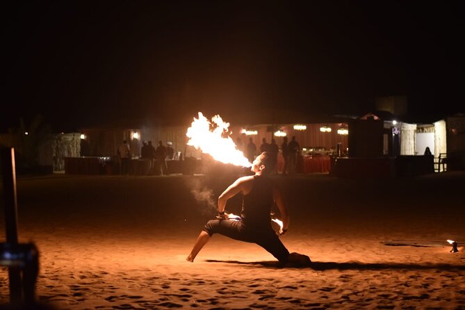 Dubai Evening Desert safari & BBQ Dinner-Pickup From Dubai mall - Sand boarding, sunset, and a camel photo stop