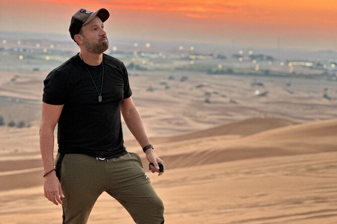 Dubai Evening Desert Safari With BBQ & Camel Ride - Sunset from the top of a dune