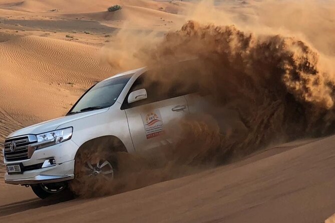 Dubai Evening Desert Safari with BBQ & Live Entertainment - Sunset photography from the high dunes