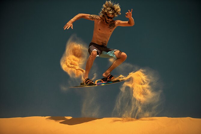 Dubai Evening Desert Safari with Thrilling Dune Buggy Adventure - Dinner and live entertainment from the camp stage