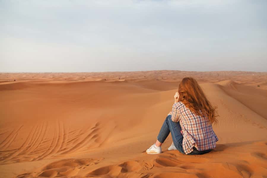 Dubai: Evening Tour with Quad Biking, Camel Ride, and BBQ - Red dunes, sharp drops, and sandboarding
