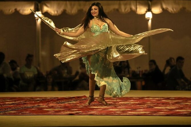 Dubai Fort Lisaili Desert Experience: Camel Ride, BBQ & Transfers - Camel riding, archery, and henna