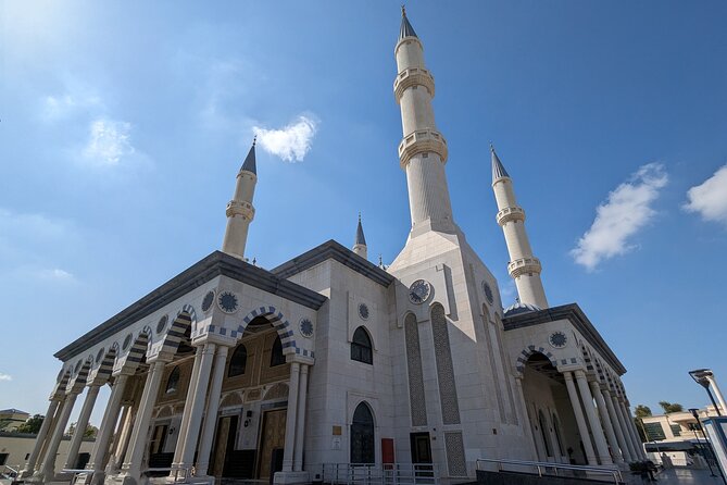 Dubai: Frame Tickets, Creek, Souks & Blue Mosque Guided Tour - Crossing Dubai Creek by Abra