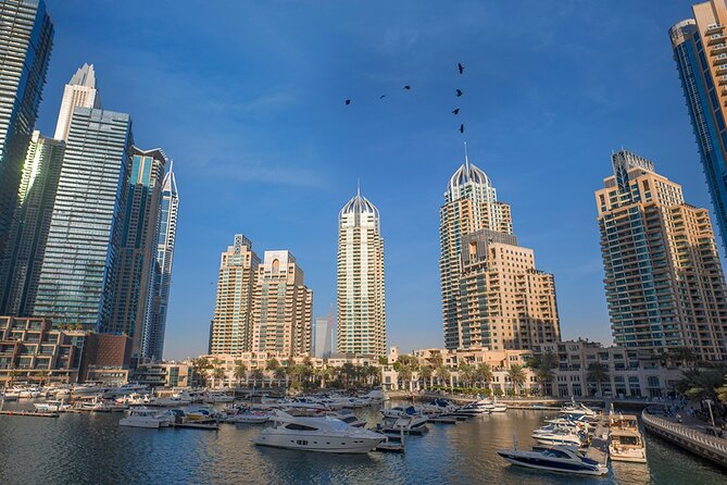 Dubai Full-Day City Tour: Souk, Palm Monorail, Abra Ride & Mosque - Dubai Marina: a short walk among towers and yachts