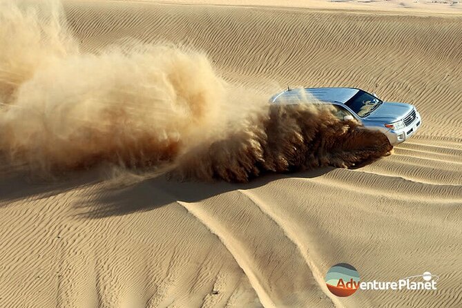Dubai Full-Day Desert Safari Experience with Live BBQ Dinner - Camel riding and sandboarding
