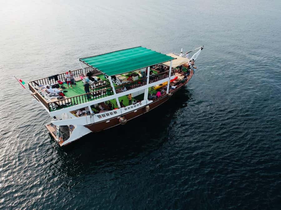Dubai: Full-Day Sea Safari to Musandam - Boarding the traditional dhow at Dibba