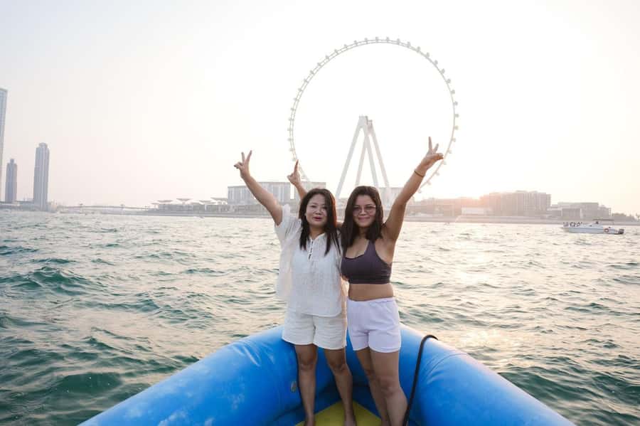 Dubai: Guided Speedboat Tour with City Sights & Ice Cream. - Along Palm Jumeirah toward Atlantis