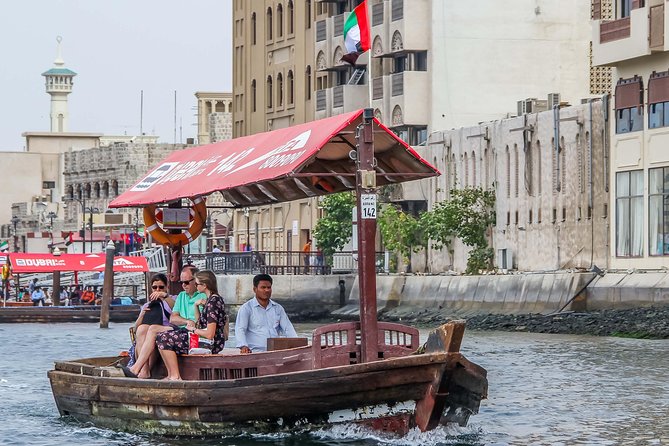Dubai Half-Day City Tour with Visit to Dubai Gold Souk - Guides, drivers, and the shared vehicle