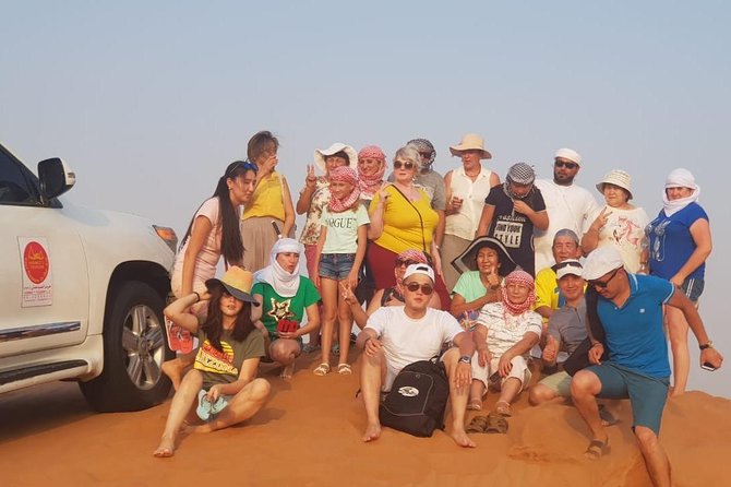 Dubai Half day Desert Safari Quad Bike & Flying Dress Photoshoot - BBQ Dinner and Desert Camp Entertainment