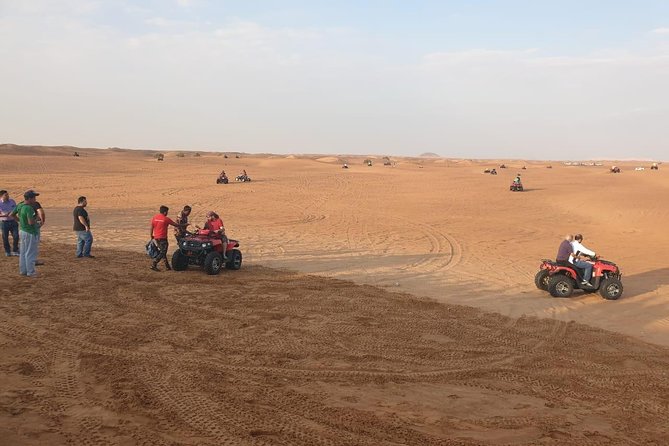 Dubai Half day Desert Safari Quad Bike & Flying Dress Photoshoot - Red-Dune Bashing for 30 to 45 Minutes