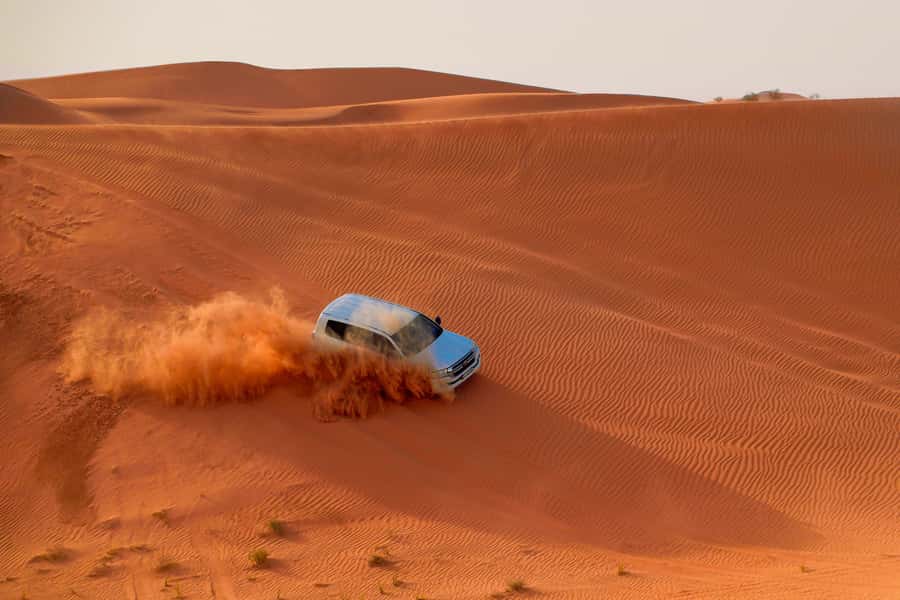 Dubai: Helicopter Ride, Desert Safari, Camels & Refreshments - Optional quad biking across Lahbab