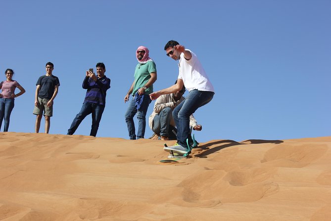 Dubai: Jeep Desert Safari, Camel Ride, and Quad Bike Tour - Sandboarding and dune photos