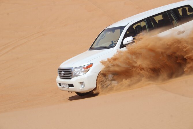 Dubai: Jeep Desert Safari, Camel Ride, and Quad Bike Tour - Safety, comfort, and what to pack