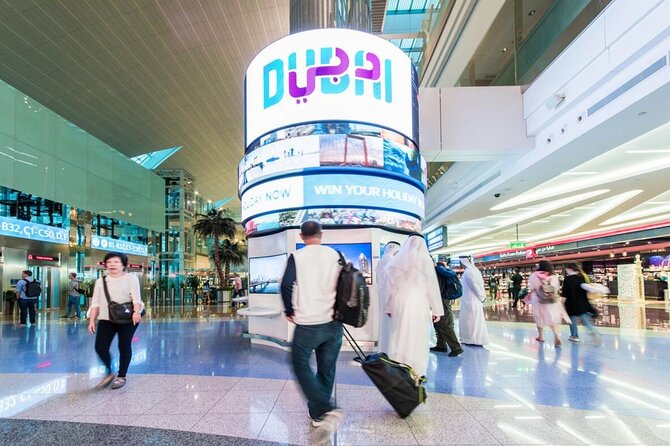Dubai Layover Stopover & Transit Tour with Private Transfers - Burj Khalifa and Dubai Mall: Dubai’s grand opening scene