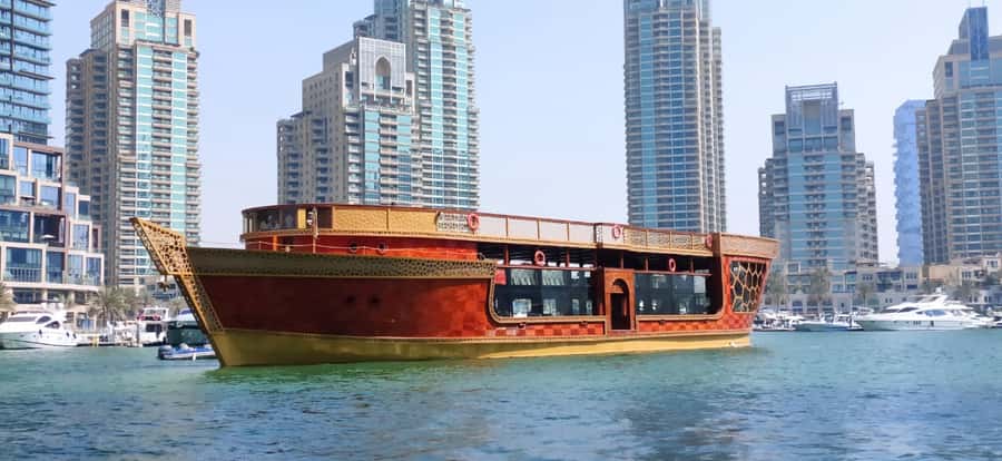 Dubai Marina: Dinner Cruise in a Traditional Boat - Boarding at the Marina: Allow Extra Time