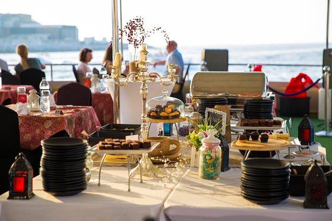Dubai Marina Dinner Cruise with Live Music & Open Bar - A polished boat and a busy Dubai setting