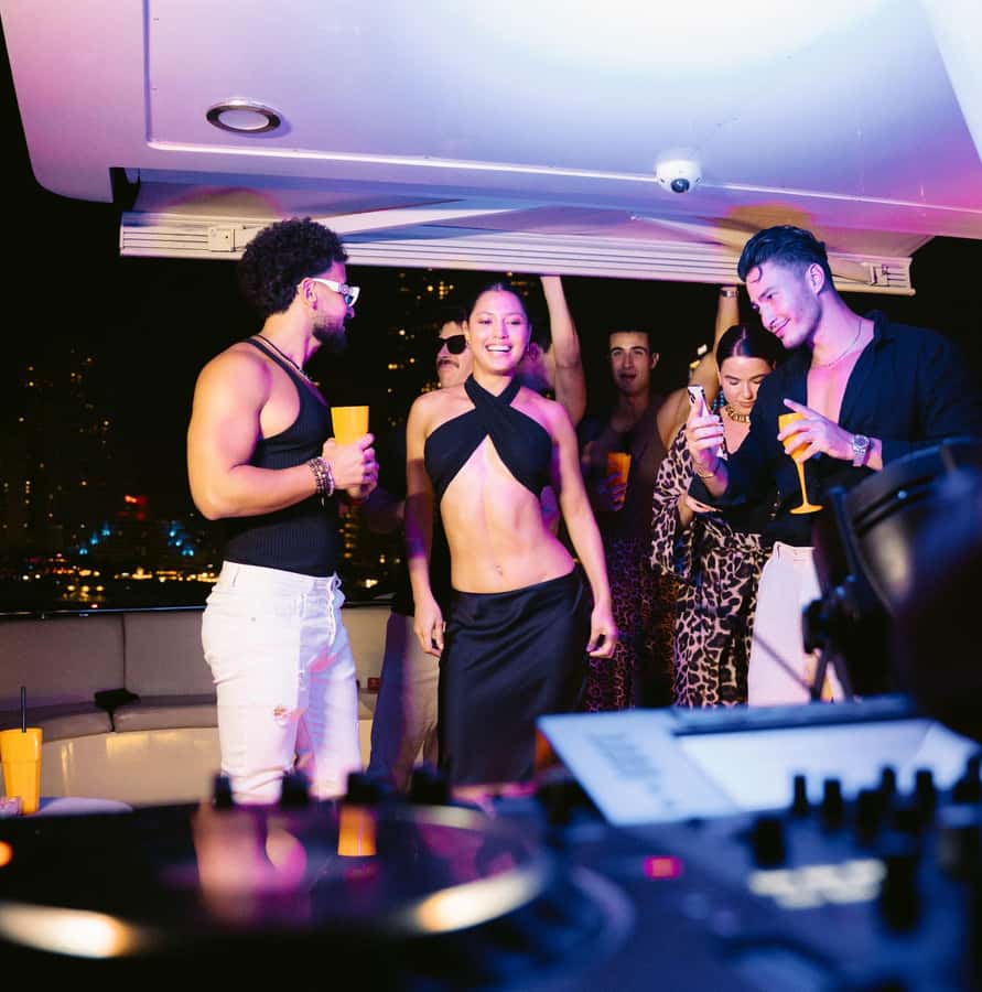 Dubai: Marina Yacht Party with BBQ, Unlimited Drinks and DJ - The DJ and the party crowd